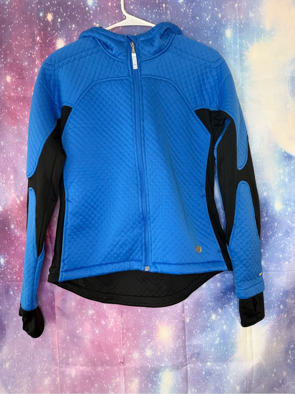 blue and black Nike Sphere Thermal full-zip hooded activewear jacket